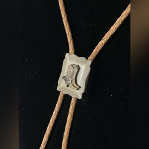 Vintage western cowboy boots silver and brass bolo tie